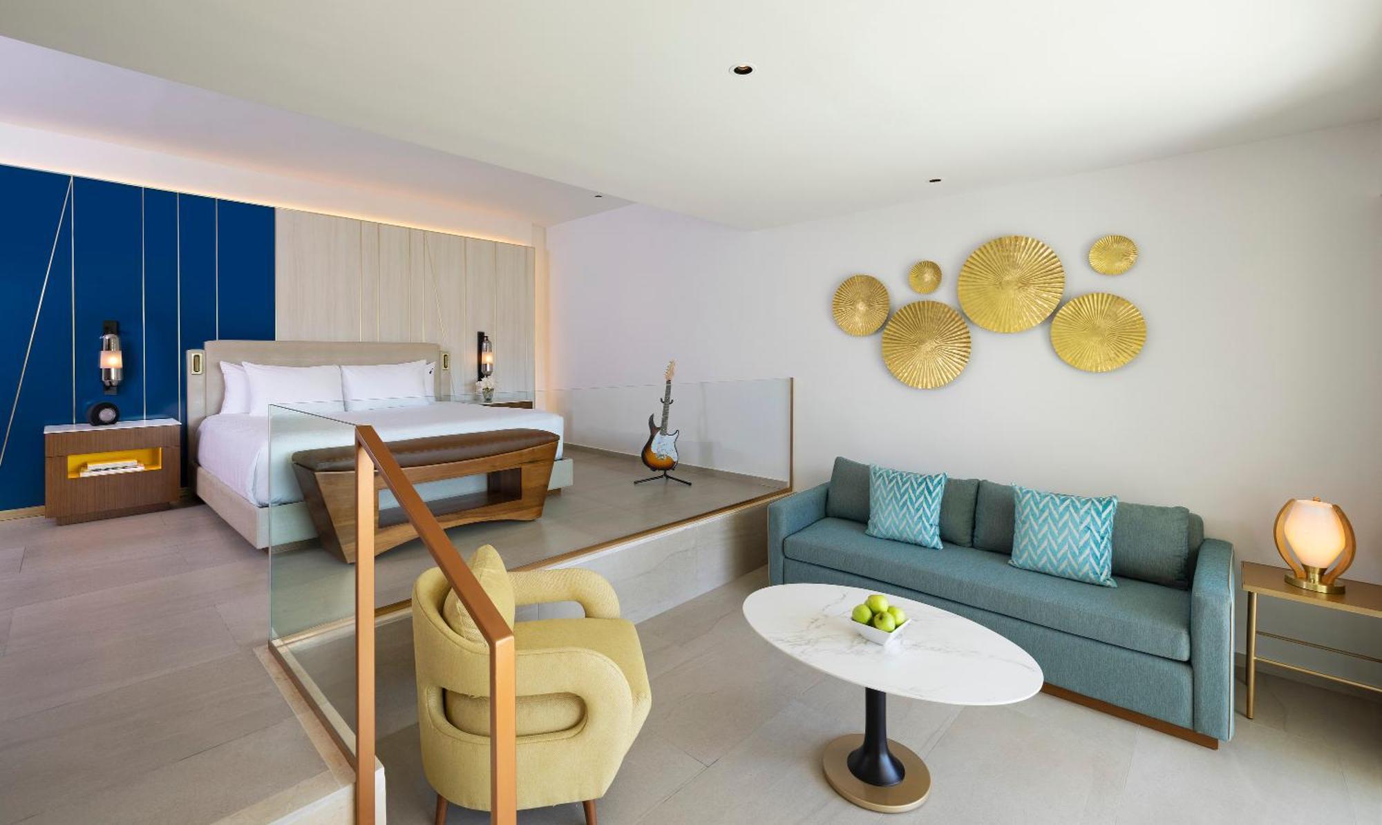 Suite Lit King-Size Caraïbes avec Canapé